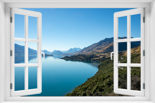 Fototapeta Naklejka Na Ścianę Okno 3D - Gorgeous view of  blue calm lake surrounding with mountains from viewpoint on the way to Glennorchy in South Island, New Zealand.