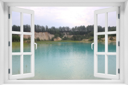 Fototapeta Naklejka Na Ścianę Okno 3D - Kaolin quarry. Beautiful turquoise water.