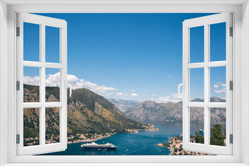 Fototapeta Naklejka Na Ścianę Okno 3D - Montenegro Adriatic Sea and mountains. Picturesque panorama of the city of Kotor on a summer day. Panoramic view of the Bay of Kotor and the city. Cruise liner in the Bay of Kotor