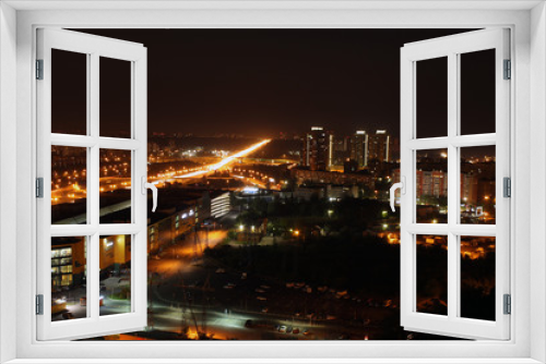 Fototapeta Naklejka Na Ścianę Okno 3D - An abstract panoramic view of the city at night