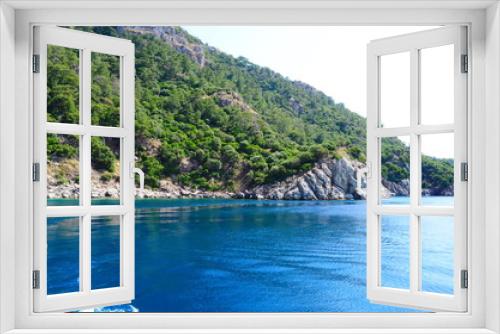 Fototapeta Naklejka Na Ścianę Okno 3D - A boat trip on the Aegean Sea overlooking the islands