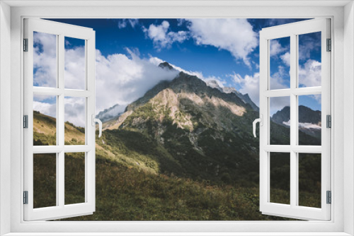 Panorama view on mountains scene in national park of Dombay, Caucasus