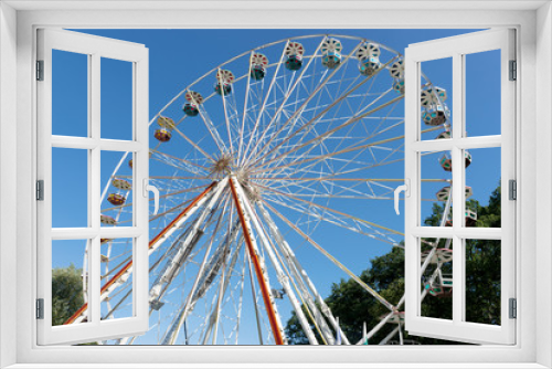 Fototapeta Naklejka Na Ścianę Okno 3D - Big ferris wheel in front of blue sky in summer