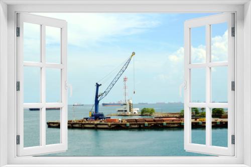 Fototapeta Naklejka Na Ścianę Okno 3D - Crane on the construction site in the port of Cristobal, Panama.