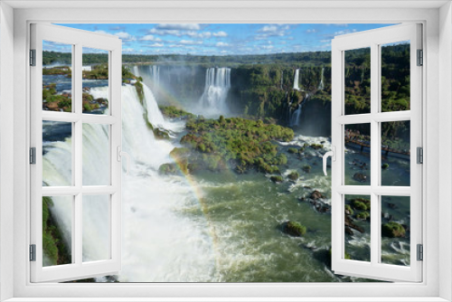 Fototapeta Naklejka Na Ścianę Okno 3D - Cascade of Iguazu Waterfalls with rainbow, Iguacu River. Located between Argentina and Brazil. 