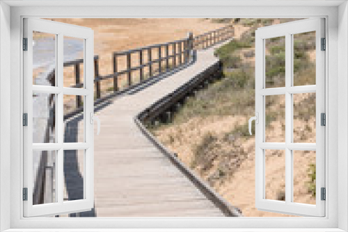 Fototapeta Naklejka Na Ścianę Okno 3D - wooden walkway to access the beach