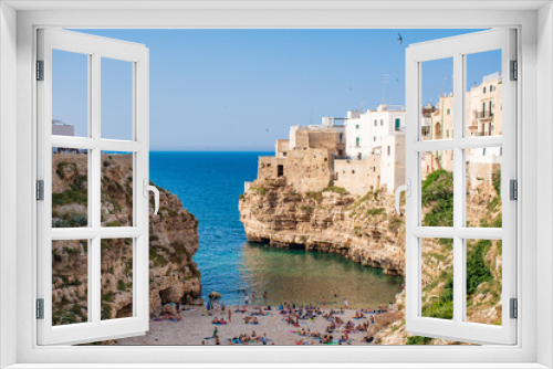 Fototapeta Naklejka Na Ścianę Okno 3D - Panoramic city skyline with white houses and beach, town on the rocks, Puglia region, Italy, Europe. Traveling concept background with blue sea