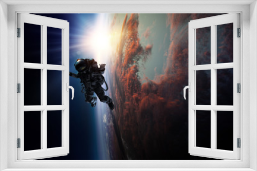 Fototapeta Naklejka Na Ścianę Okno 3D - Astronaut in space on planet orbit.