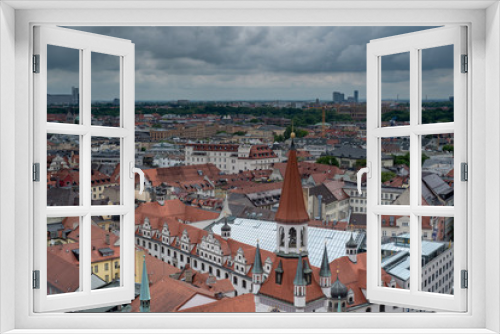 Fototapeta Naklejka Na Ścianę Okno 3D - General aerial view of Munich from a tower featuring rooftops of buildings