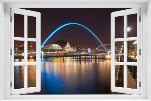 Fototapeta Naklejka Na Ścianę Okno 3D - Newcastle and Gateshead quayside at night scene of River Tyne bridges and Sage