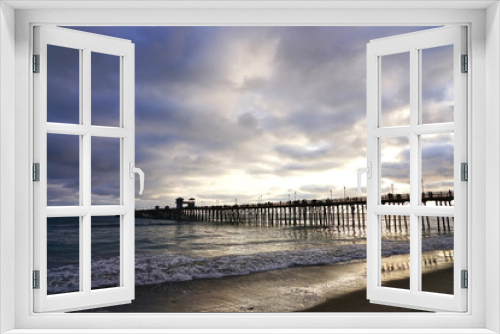 Fototapeta Naklejka Na Ścianę Okno 3D - The ocean view, pier bridge playground and sunset
