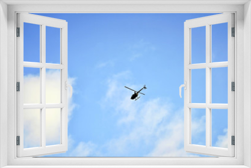 Fototapeta Naklejka Na Ścianę Okno 3D - Helicopter flying in the sky