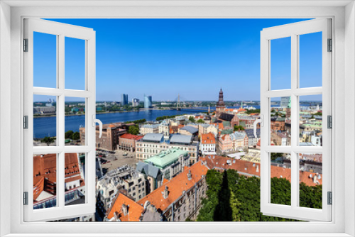 Fototapeta Naklejka Na Ścianę Okno 3D - View over the old town of Riga, Latvia, to the Daugava river. Shot from the bell tower of St. Peter.