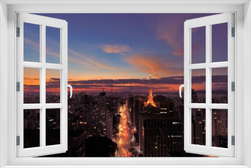 Fototapeta Naklejka Na Ścianę Okno 3D - Aerial view of sunset in Sao Paulo city, Brazil. Great sunset scene. Fantastic landscape. Business city. Business travel. Business concept. Sunset collection. Colored sky. Dusk sky scenery. 