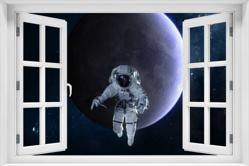 Fototapeta Naklejka Na Ścianę Okno 3D - Astronaut on background of the Moon. Solar system. Science fiction. Elements of this image furnished by NASA