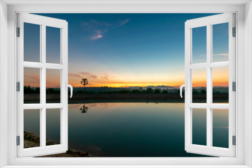 Fototapeta Naklejka Na Ścianę Okno 3D - View at Ban Thong Suk Reservoir, Songkhla, Thailand at sunrise.
