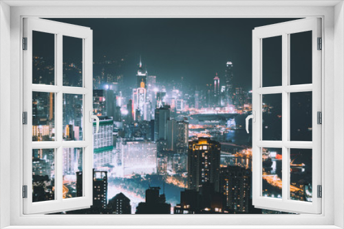 Fototapeta Naklejka Na Ścianę Okno 3D - Hong Kong Island night view in a teal & orange colour tone from Braemar hill. A destination viewpoint to observe Victoria Harbour & Hong Kong city skyline.