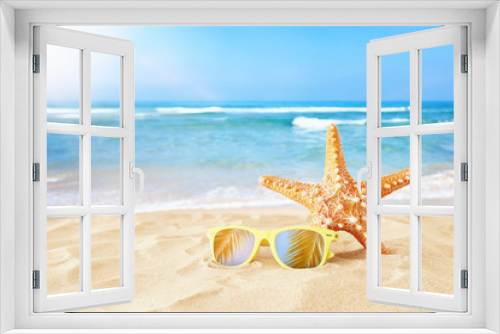 Fototapeta Naklejka Na Ścianę Okno 3D - holidays. sand beach, sunglasses and starfish in front of summer sea background with copy space