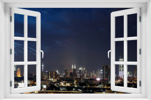 Fototapeta Naklejka Na Ścianę Okno 3D - View of Kuala Lumpur Skyline from top of a building KL tower KLCC Tun Razak Exchange TRX