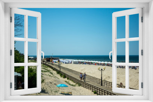 Fototapeta Naklejka Na Ścianę Okno 3D - .wooden promenade on the sea beach