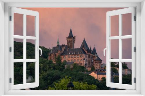 Fototapeta Naklejka Na Ścianę Okno 3D - Das Schloss Wernigerode mit roten Wolken im Hintergrund