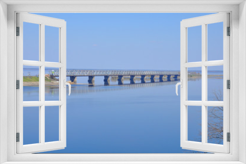 Fototapeta Naklejka Na Ścianę Okno 3D - wide river Dnieper. Across the river concrete bridge