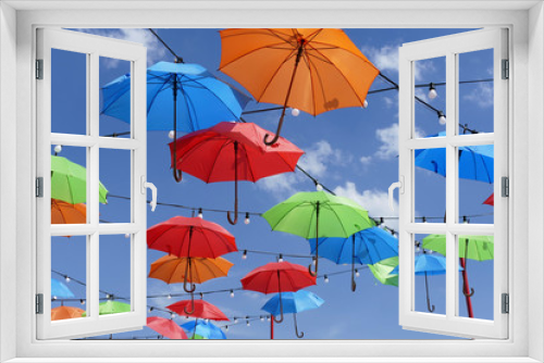 Fototapeta Naklejka Na Ścianę Okno 3D - Colorful umbrellas in the sky with white clouds  
