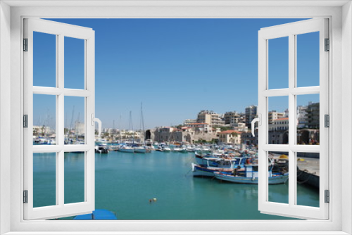 Fototapeta Naklejka Na Ścianę Okno 3D - Street on the pier with yachts in the resort town of Heraklion, Crete