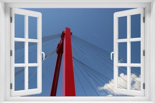 Fototapeta Naklejka Na Ścianę Okno 3D - Red colored Willemsbrug over river Nieuwe Maas in Rotterdam, the Netherlands