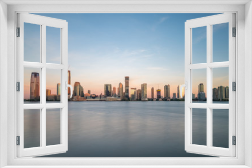 Fototapeta Naklejka Na Ścianę Okno 3D - Long Exposure Panormic View of New Jersey Architecture At Sunrise