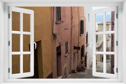 Fototapeta Naklejka Na Ścianę Okno 3D - Narrow street in old town of Sardinia italy