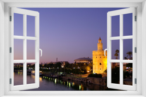 Seville (Spain). Night view of the Torre del Oro in the city of Seville