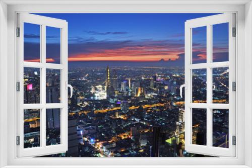 Fototapeta Naklejka Na Ścianę Okno 3D - Bangkok, Thailand -April 16, 2019 :Night light in Bangkok Thailand from a roof top