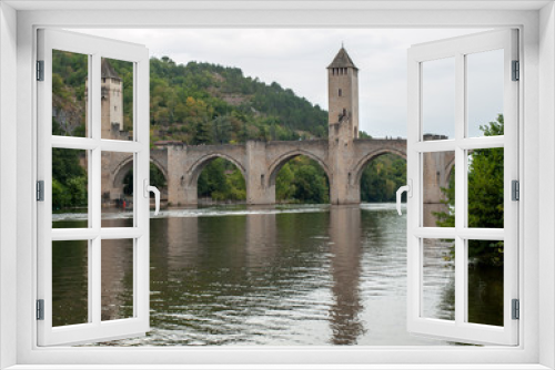 Fototapeta Naklejka Na Ścianę Okno 3D - The medieval Pont Valentre over the River Lot, Cahors, The Lot, France