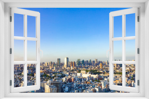 Fototapeta Naklejka Na Ścianę Okno 3D - 夕方の東京の街並み