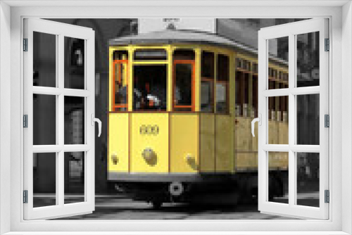 Fototapeta Naklejka Na Ścianę Okno 3D - tram giallo a milano in italia, yellow streetcar in the downtown of milan city in italy 