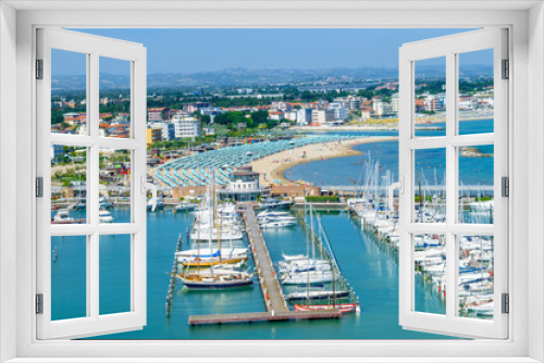 Fototapeta Naklejka Na Ścianę Okno 3D - Aerial view of Rimini beach and docks in Italy
