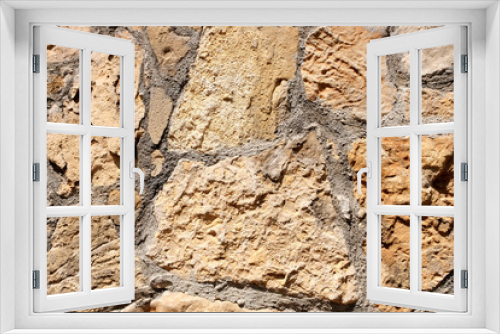 Fototapeta Naklejka Na Ścianę Okno 3D - Texture. Stone masonry of an ancient fortress. Retro or grunge texture. Abstract image of a stone wall. Bright background.