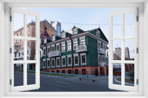 Fototapeta Naklejka Na Ścianę Okno 3D - Russia, Khabarovsk, may 1, 2019:Renovated old house in the center of Khabarovsk