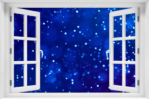 Fototapeta Naklejka Na Ścianę Okno 3D - Science fiction. Glow blue particles on blue background are hanging in air for bright festive presentation with depth of field and light bokeh effects. Version 10