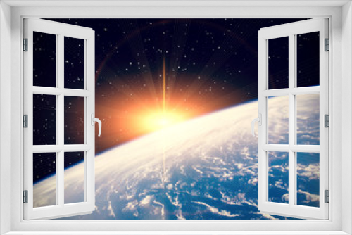 Fototapeta Naklejka Na Ścianę Okno 3D - Sunrise on the planet earth. The elements of this image furnished by NASA.