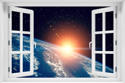 Fototapeta Naklejka Na Ścianę Okno 3D - Thrilling sunrise from space. The elements of this image furnished by NASA.