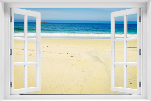 Fototapeta Naklejka Na Ścianę Okno 3D - Seascape sandy beach with lighthouse on horizon
