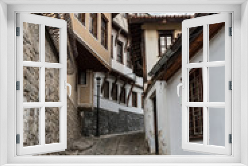 Fototapeta Naklejka Na Ścianę Okno 3D -  View of a narrow street in  historical part of  Plovdiv Old Town. Typical medieval colorful buildings. Bulgaria