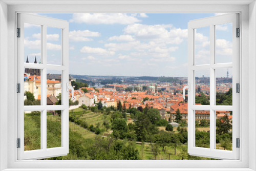Fototapeta Naklejka Na Ścianę Okno 3D - Summer Prague City with gothic Castle and the green Nature  from the Hill Petrin, Czech Republic
