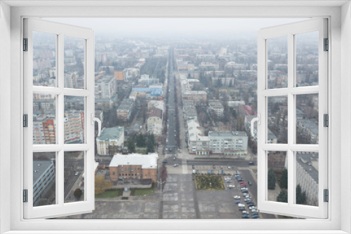 Fototapeta Naklejka Na Ścianę Okno 3D -  Aerial view of the poor Ukrainian city Kremenchuk. Dullness, boredom, bad hike, dirty air. Drone photography.