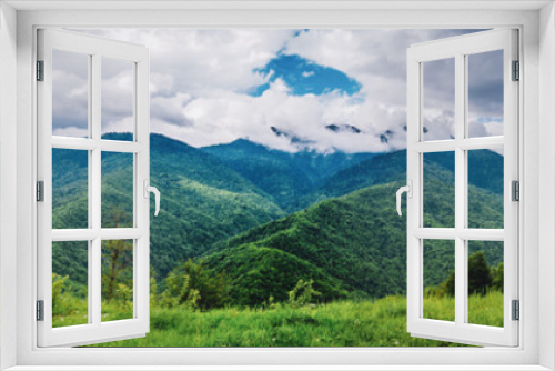 Fototapeta Naklejka Na Ścianę Okno 3D - Mountain forest and clouds