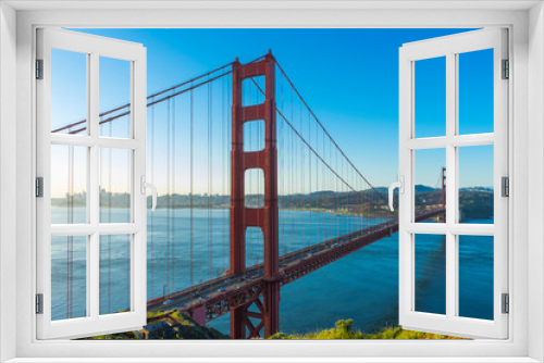Fototapeta Naklejka Na Ścianę Okno 3D - Golden Gate Bridge at sunrise and blue sky in San Francisco , USA