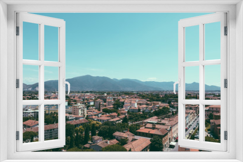 Fototapeta Naklejka Na Ścianę Okno 3D - Panoramic view of Pisa city with historic buildings and far away mountains
