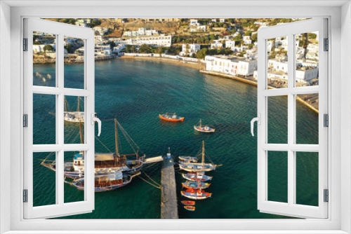 Fototapeta Naklejka Na Ścianę Okno 3D - Aerial drone photo of picturesque and beautiful whitewashed old port in main town of Mykonos island, Cyclades, Greece